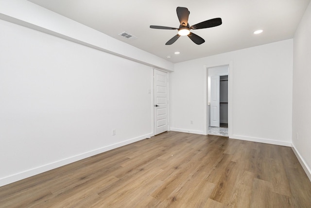 unfurnished bedroom featuring visible vents, recessed lighting, light wood-style floors, and baseboards