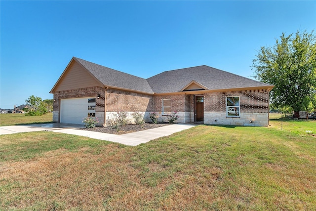 ranch-style home featuring brick siding, a front lawn, roof with shingles, a garage, and driveway