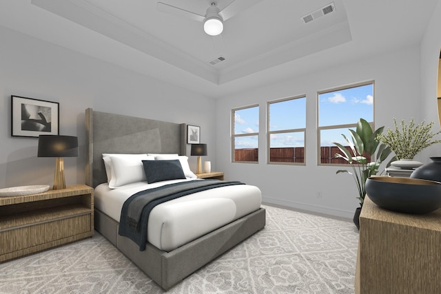 carpeted bedroom featuring a tray ceiling, baseboards, visible vents, and ornamental molding