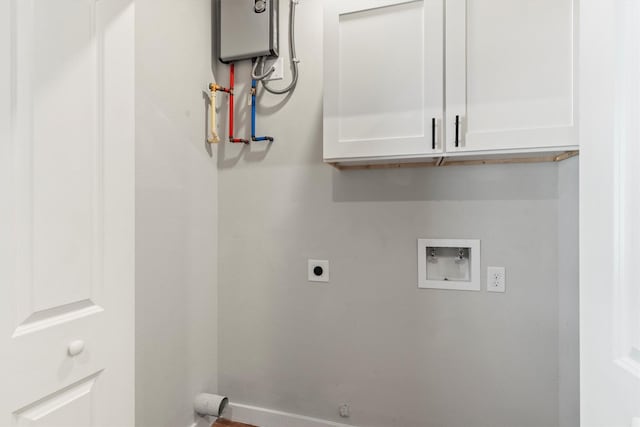 laundry area featuring cabinet space, baseboards, hookup for an electric dryer, and washer hookup