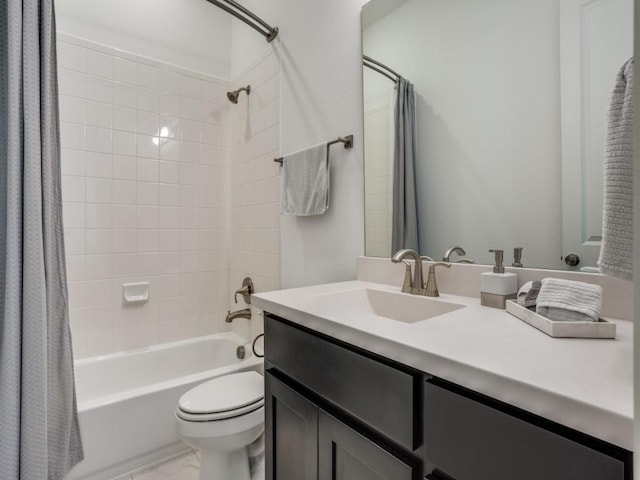 bathroom with vanity, toilet, and shower / bathtub combination with curtain