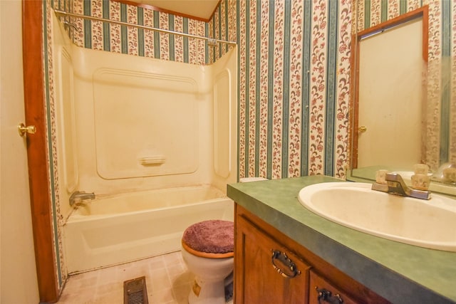 full bath featuring vanity, visible vents, shower / bathing tub combination, toilet, and tile patterned floors