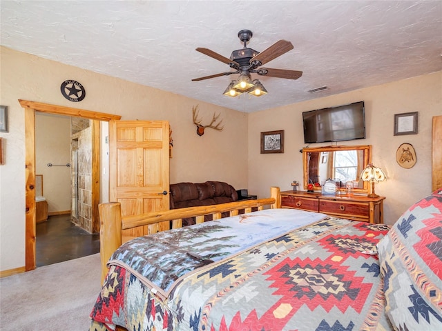 carpeted bedroom with visible vents, baseboards, a textured ceiling, and a ceiling fan