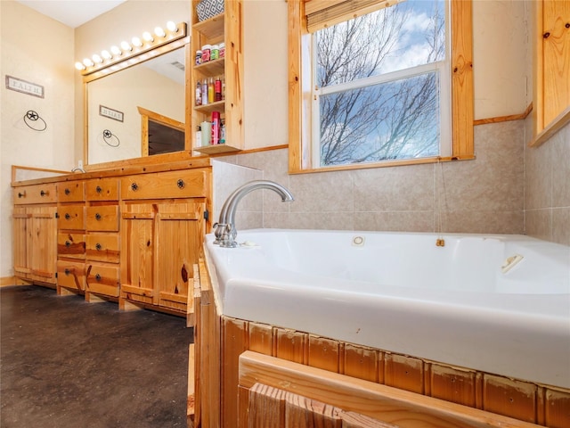 full bathroom with vanity and a garden tub