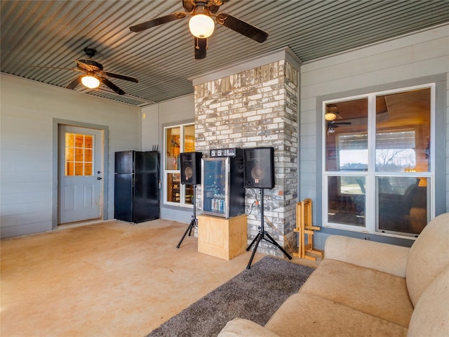 interior space featuring ceiling fan