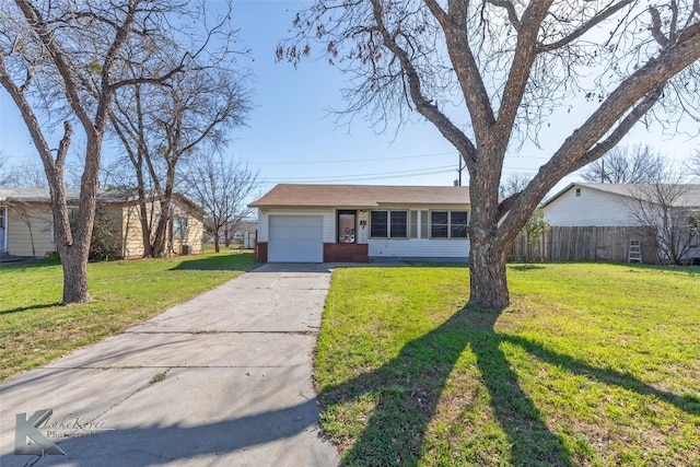 ranch-style home featuring brick siding, a front lawn, concrete driveway, and a garage