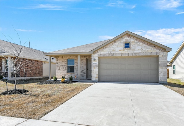 view of front of home with driveway and a garage