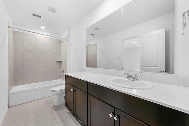 full bathroom with vanity, tile patterned floors, toilet, and visible vents