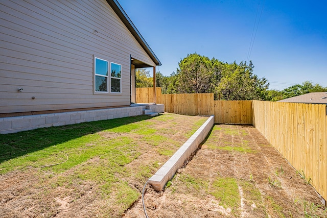 view of yard featuring a fenced backyard