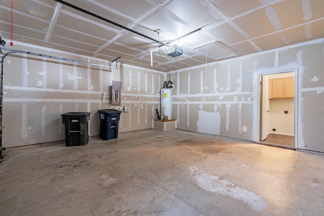 garage featuring electric panel, a garage door opener, and electric water heater