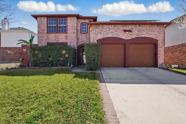 view of front of property featuring brick siding, concrete driveway, a front lawn, and fence