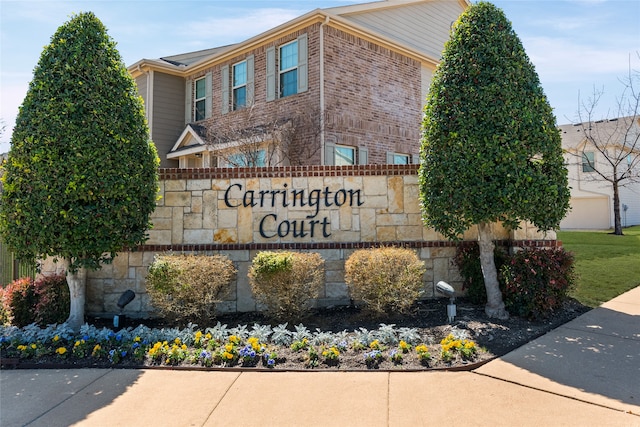 view of community sign