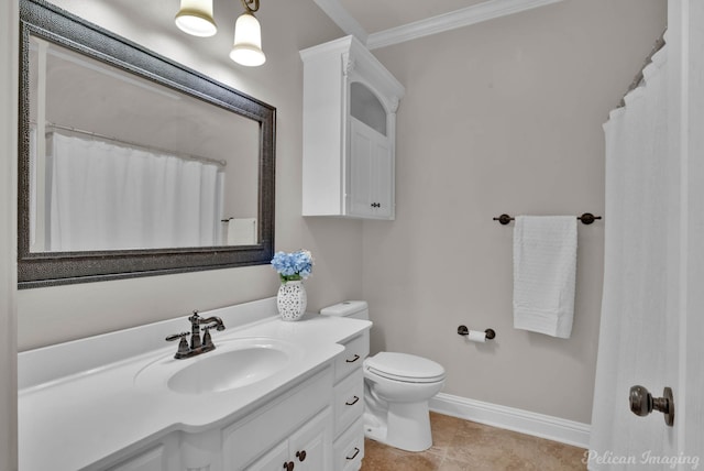 full bathroom featuring vanity, baseboards, crown molding, toilet, and tile patterned floors