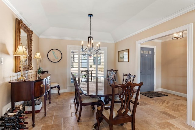 dining room featuring crown molding, baseboards, lofted ceiling, stone tile floors, and a notable chandelier