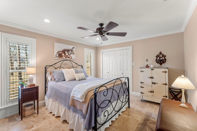 bedroom with a closet, recessed lighting, baseboards, and ornamental molding