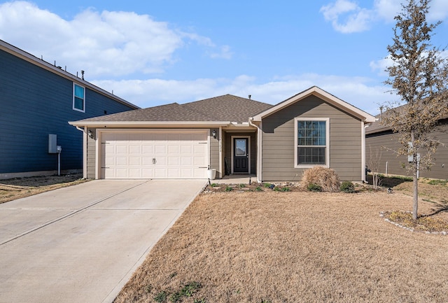 single story home featuring an attached garage, a shingled roof, and driveway