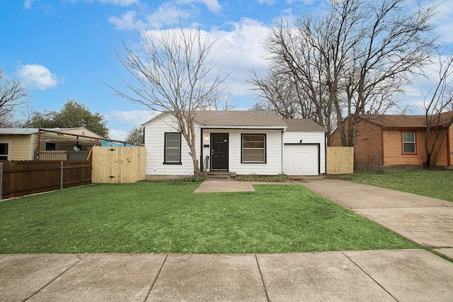 view of front facade featuring a front lawn, fence, concrete driveway, roof with shingles, and a garage