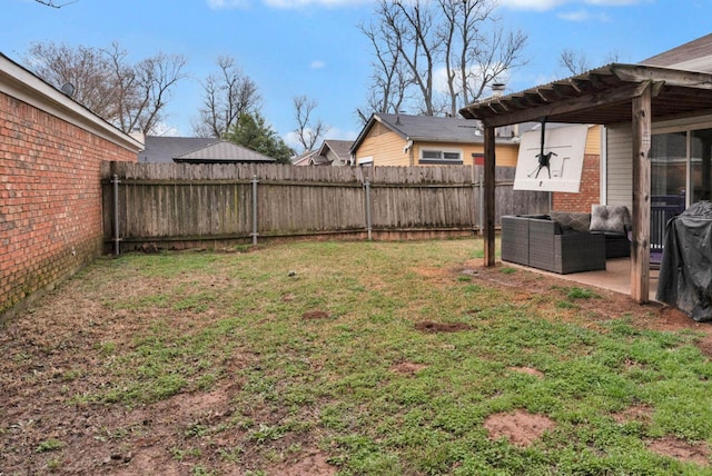 view of yard with a patio area and a fenced backyard