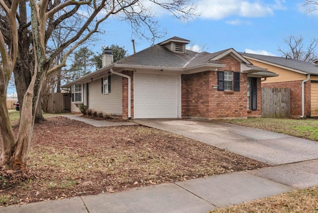 single story home featuring fence, a chimney, concrete driveway, a garage, and brick siding