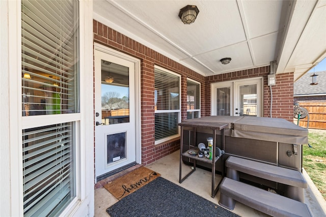 view of patio with a hot tub