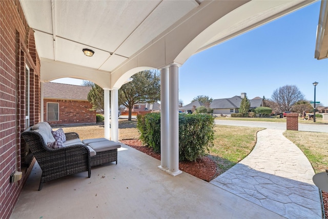 view of patio featuring a porch