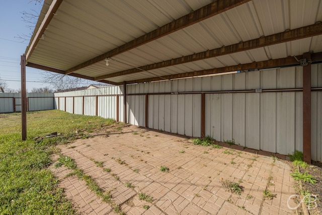 exterior space with a patio and fence