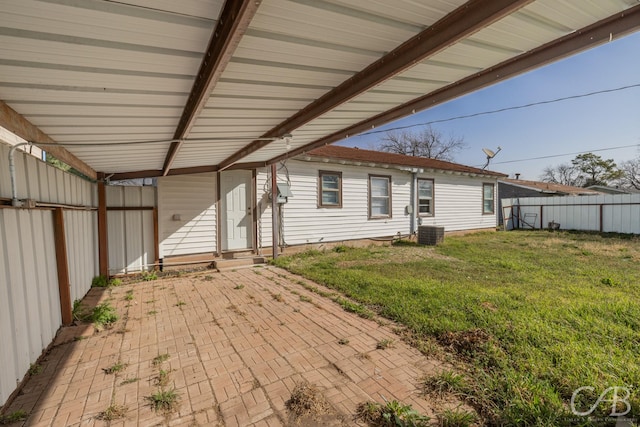 view of patio featuring central AC and a fenced backyard