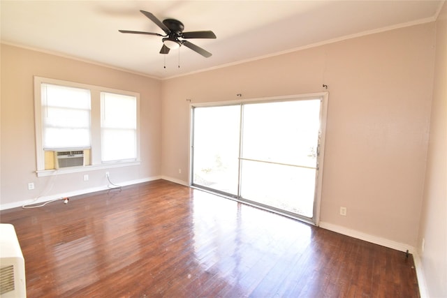 unfurnished room with ornamental molding, a ceiling fan, wood finished floors, cooling unit, and baseboards