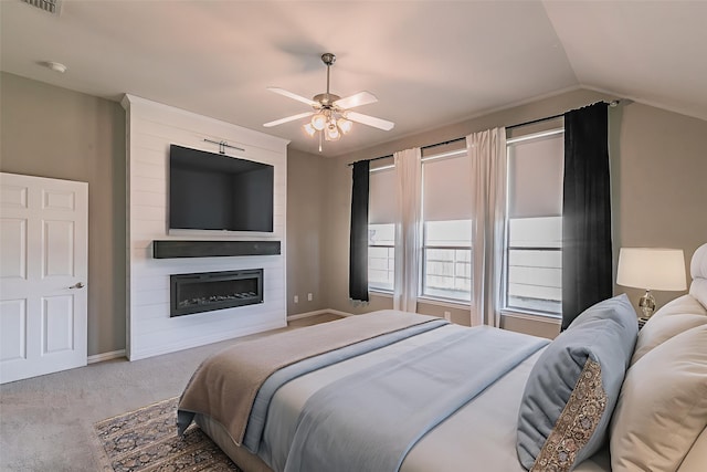 713 Cross Meadow Blvd, Mansfield, TX 76063 - carpeted bedroom with lofted ceiling, baseboards, a large fireplace, and a ceiling fan