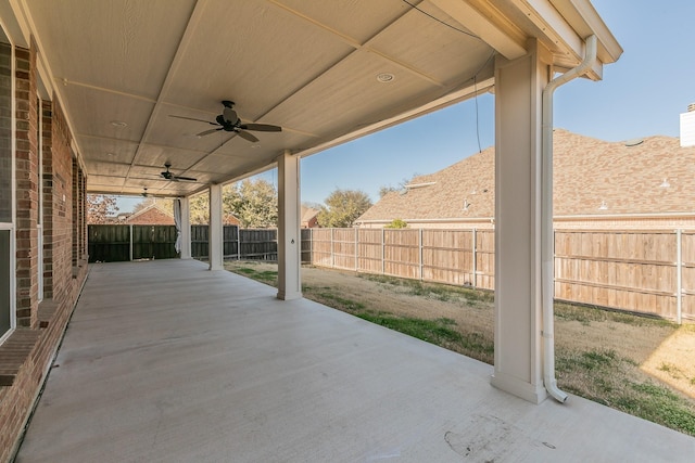 view of patio / terrace with a fenced backyard and ceiling fan