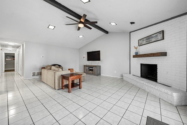 living area featuring visible vents, a brick fireplace, vaulted ceiling with beams, light tile patterned floors, and a ceiling fan