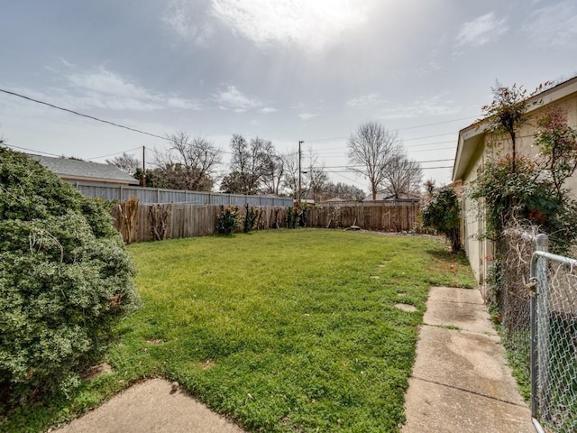 view of yard featuring a fenced backyard