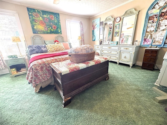 carpeted bedroom with ornamental molding