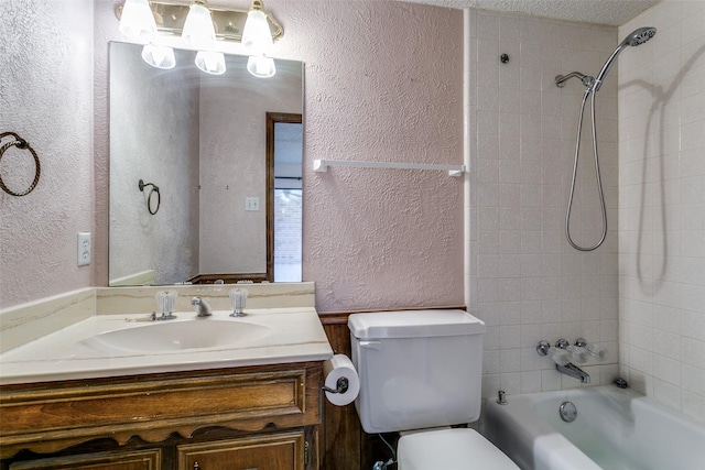 bathroom featuring toilet, shower / bathtub combination, a textured wall, a textured ceiling, and vanity