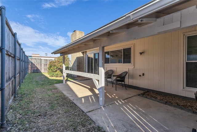 view of patio / terrace with fence