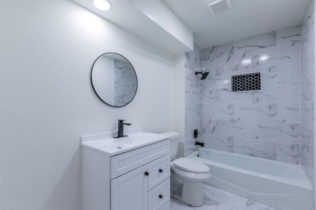 bathroom featuring vanity, visible vents, shower / tub combination, toilet, and marble finish floor