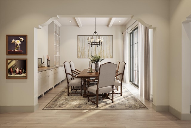 dining room featuring light wood finished floors, baseboards, beamed ceiling, recessed lighting, and a notable chandelier