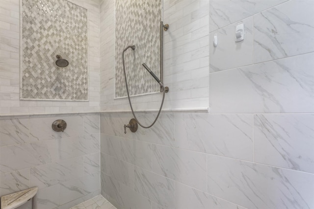 bathroom featuring tiled shower