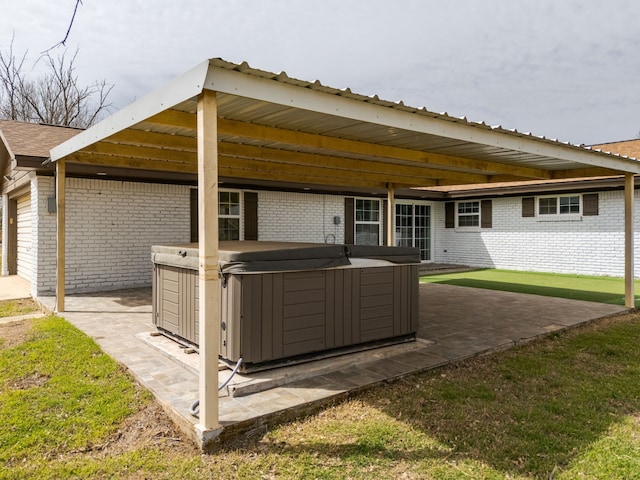 view of patio featuring a hot tub