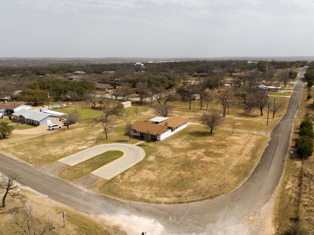 birds eye view of property featuring a rural view