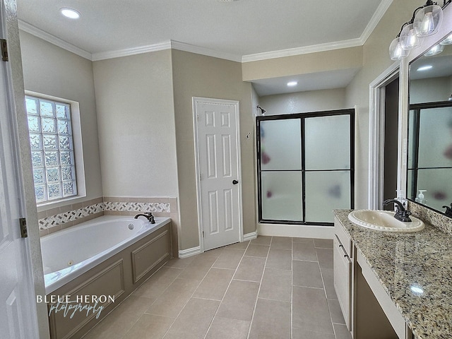 full bath with ornamental molding, a whirlpool tub, a shower stall, tile patterned flooring, and vanity