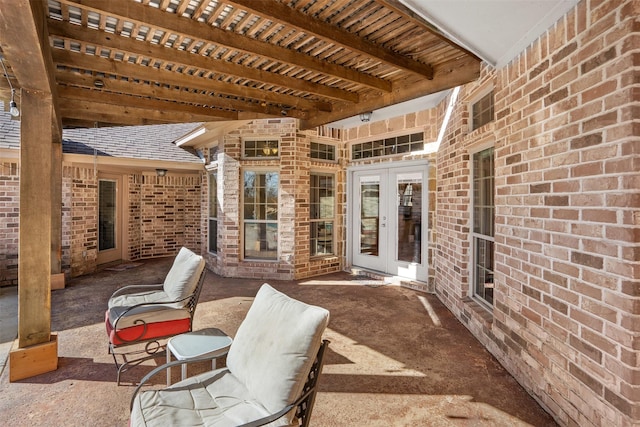 view of patio featuring french doors and a pergola