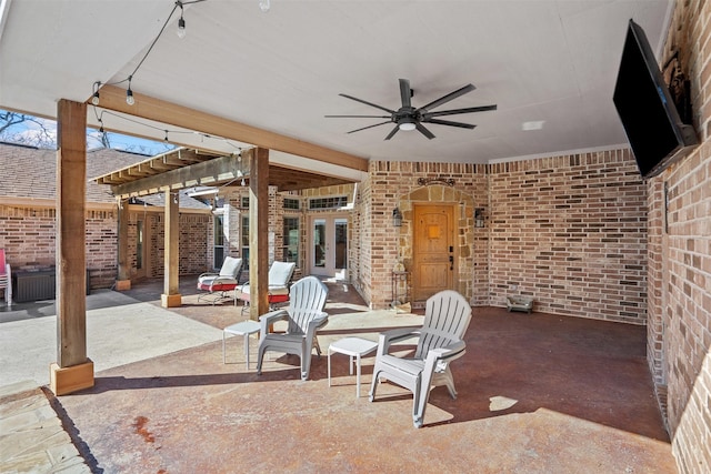 view of patio / terrace with french doors and ceiling fan