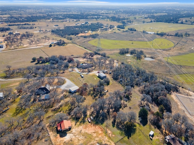 birds eye view of property featuring a rural view