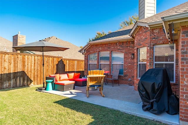 view of patio / terrace with area for grilling, an outdoor hangout area, and a fenced backyard