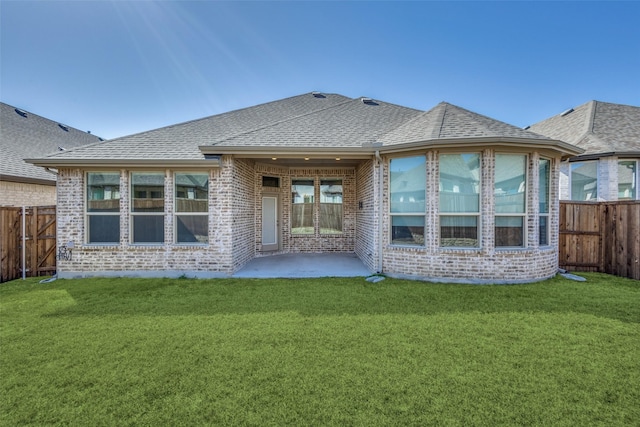 3007 Milton Dr, Melissa, TX 75454 - back of property with a fenced backyard, a yard, and brick siding