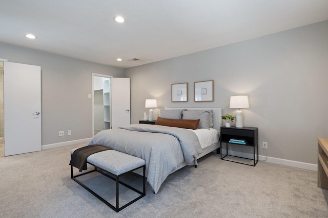 bedroom featuring recessed lighting, visible vents, baseboards, and light colored carpet