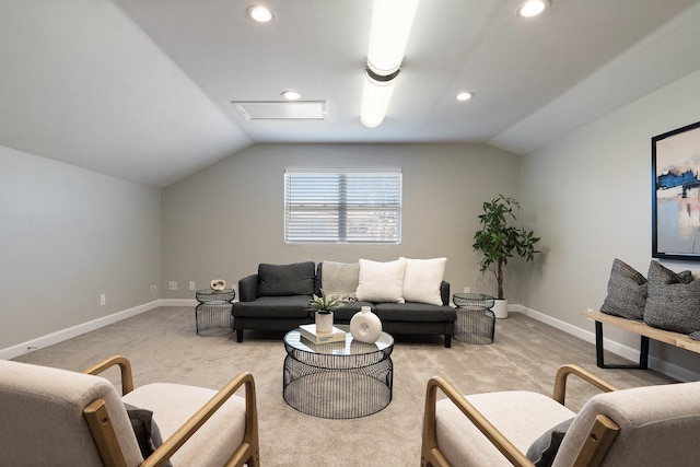 carpeted living area with vaulted ceiling, recessed lighting, and baseboards