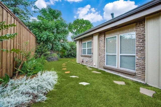 view of yard with fence