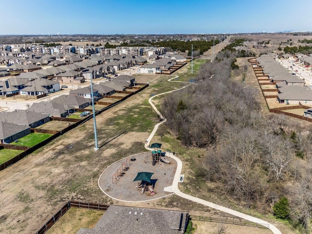 birds eye view of property with a residential view